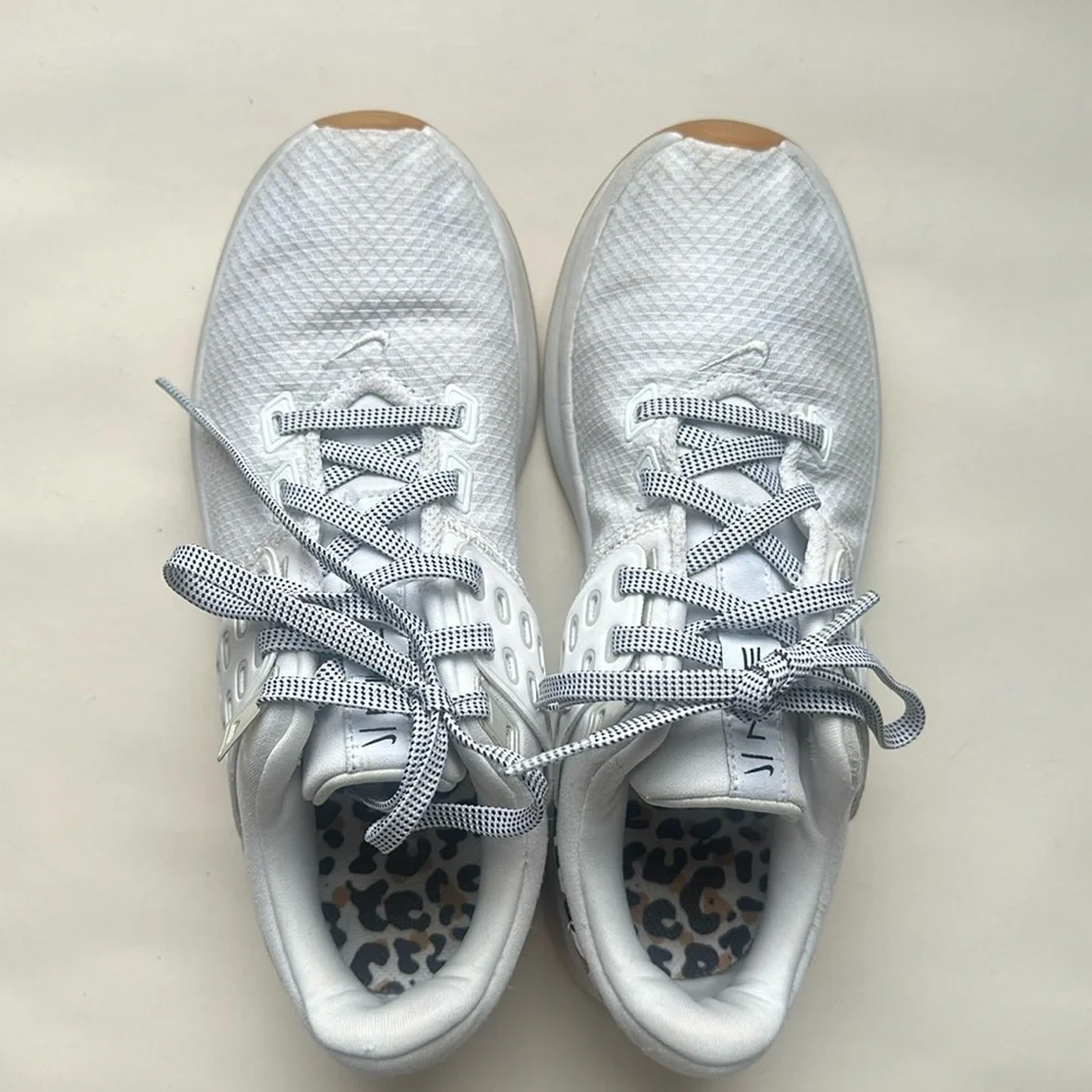 White Nike air max shoes, size 5 with gold Nike embroidering/cheetah print heal